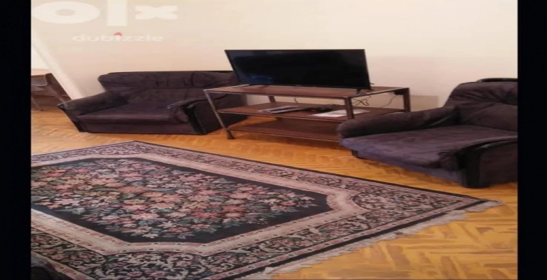 الشقة ايجار مفروش في الدقي  بشارع متميز